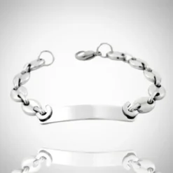 Bracelet Gourmette Homme 14 Bracelet ID homme en acier inoxydable argenté à maille grain de café, maillons ovales bombés polis réfléchissants reliés par anneaux ronds, grande plaque centrale lisse gravable, fermoir mousqueton avec anneau d'extension — bijou élégant mixte, idéal cadeau personnalisé.