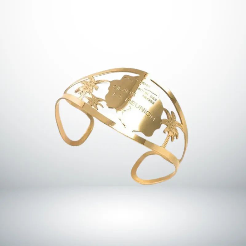 Bague La Réunion 1 Bague La Réunion dorée en acier 316 représentant la carte de l’île, palmiers et anneau réglable, bijou souvenir du 974